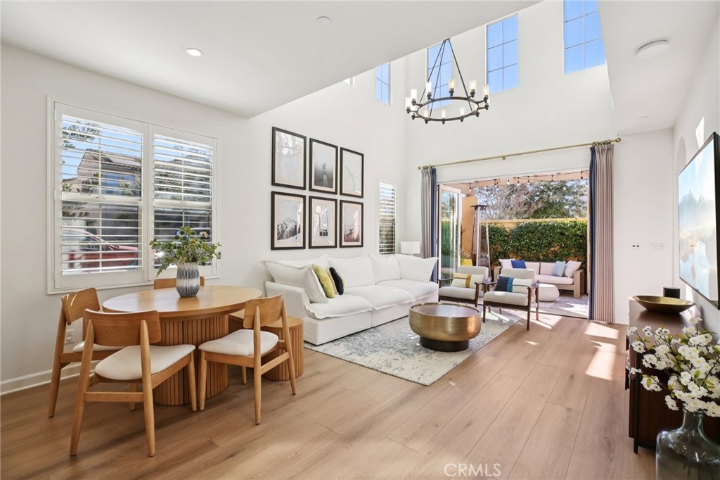 151 Soaring Eagle Irvine, CA 92618 - Photo 13 of 57 a living room with fireplace furniture and a large window