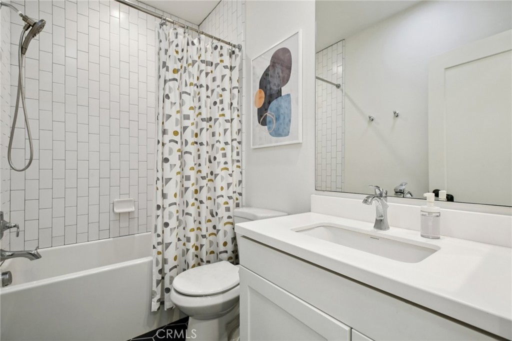 151 Soaring Eagle Irvine, CA 92618 - Photo 20 of 57 a bathroom with a sink toilet and shower