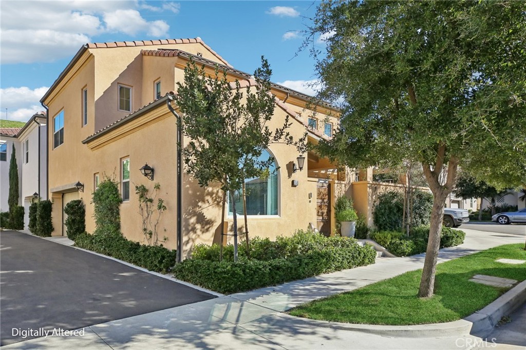 151 Soaring Eagle Irvine, CA 92618 - Photo 46 of 57 a front view of a house with garden