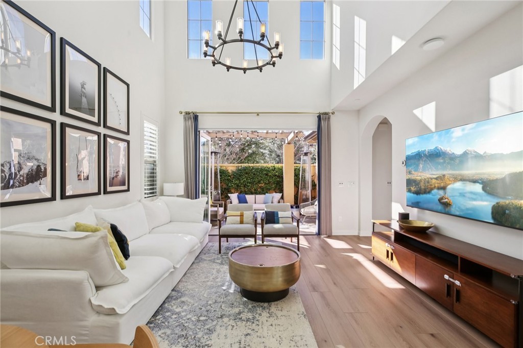 151 Soaring Eagle Irvine, CA 92618 - Photo 10 of 57 a living room with furniture and a large window