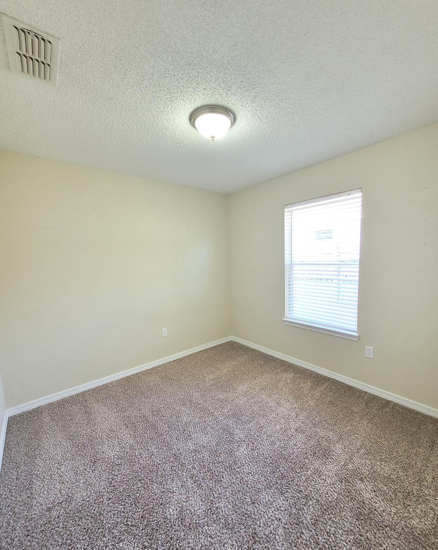268 Limestone Circle Crestview, FL 32539 - Photo 14 of 23 an empty room with a window