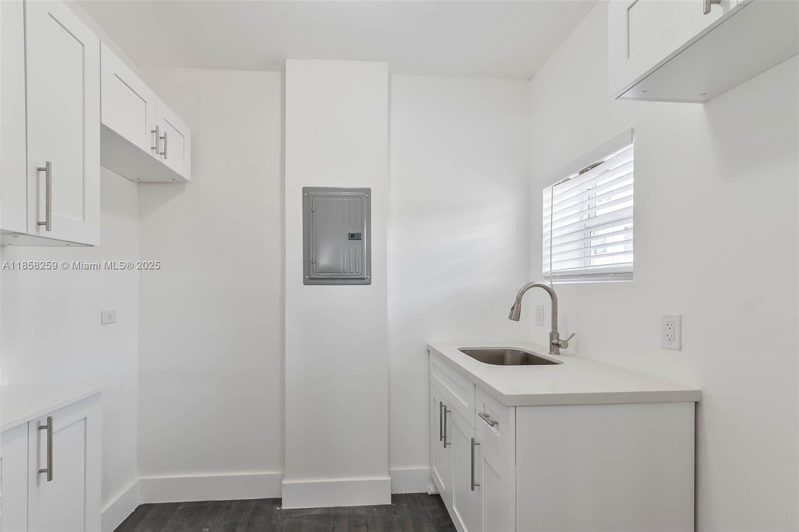 212 Northwest 15th Street, Unit 2 Miami, FL 33136 - Photo 10 of 19 a bathroom with a sink and a mirror