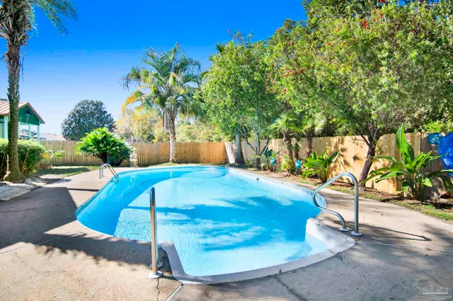 a view of a swimming pool with an outdoor space
