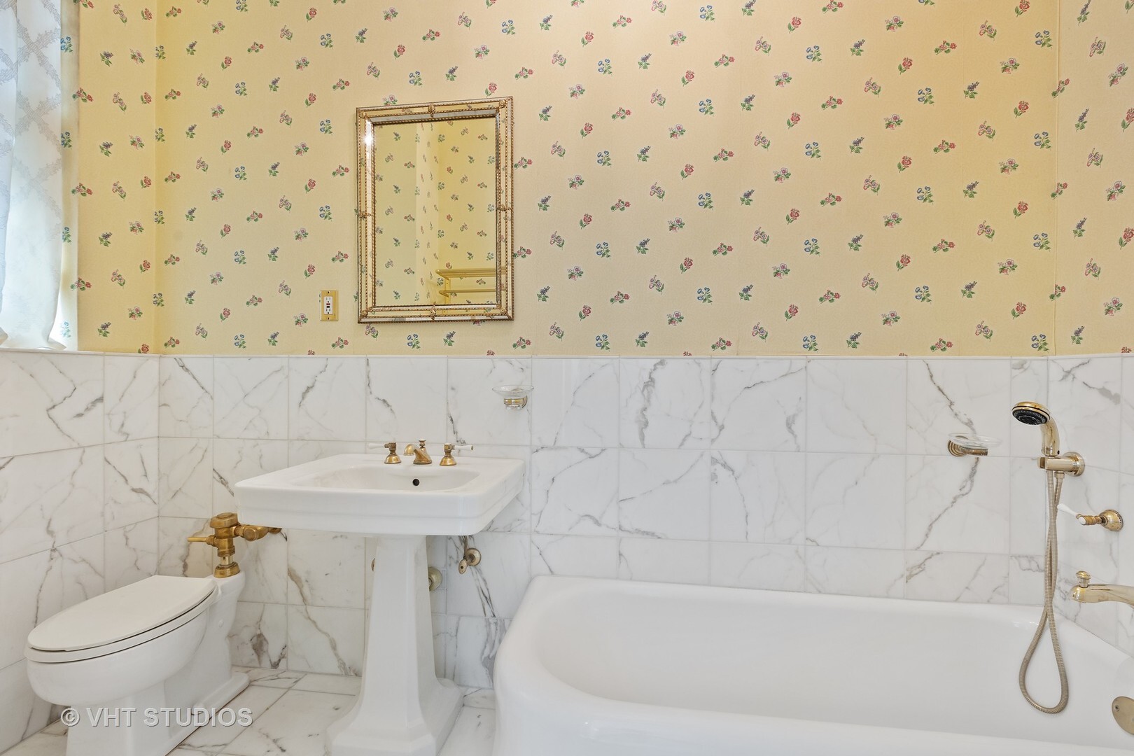 220 East Walton Place, Unit 9W Chicago, IL 60611 - Photo 17 of 22 a bathroom with a sink toilet and shower