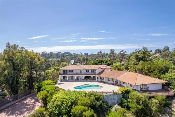 an aerial view of a house with a garden