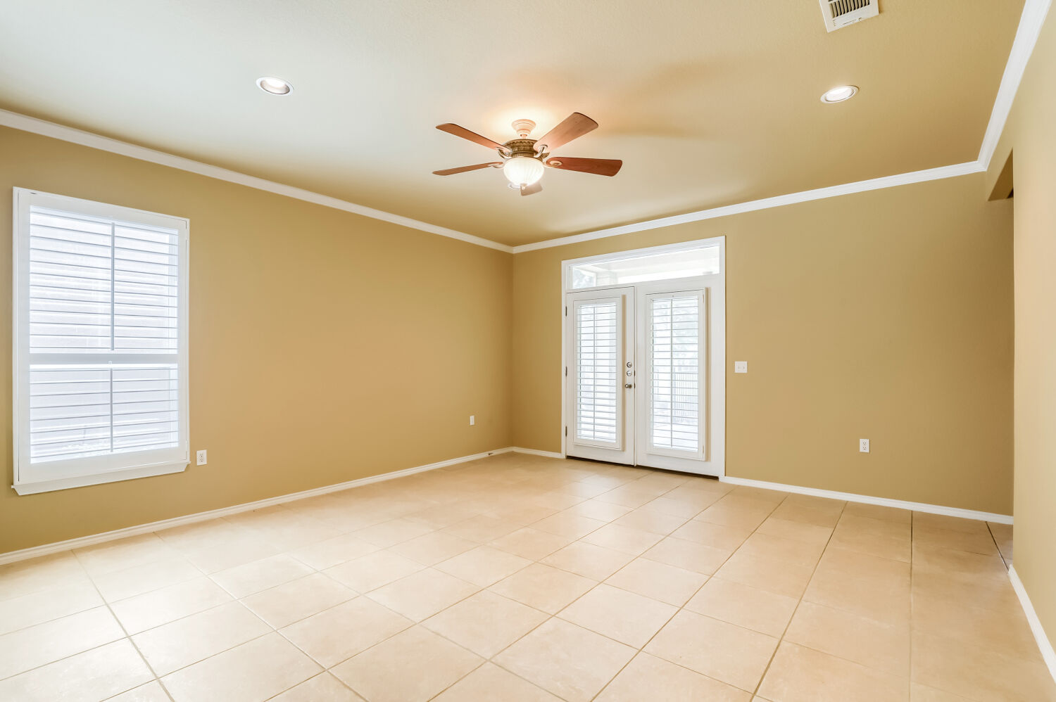 310 Crockett Loop Georgetown, TX 78633 - Photo 6 of 22 French doors open to the private screened in patio.