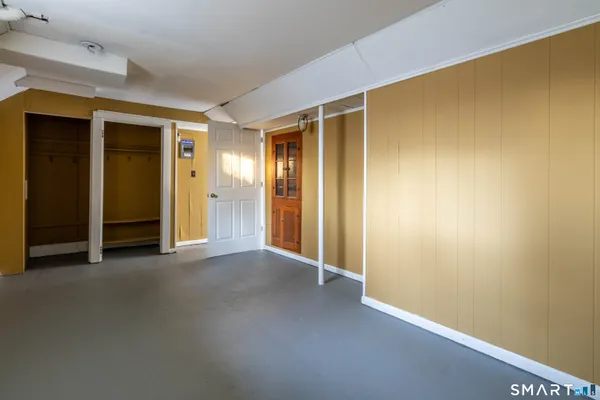 an empty room with a empty space and window