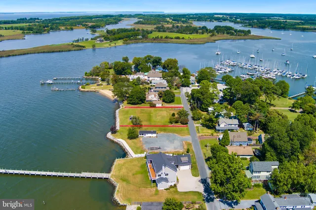an aerial view of ocean residential house with outdoor space and seating