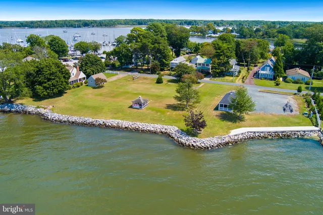 a view of a swimming pool with lounge chair