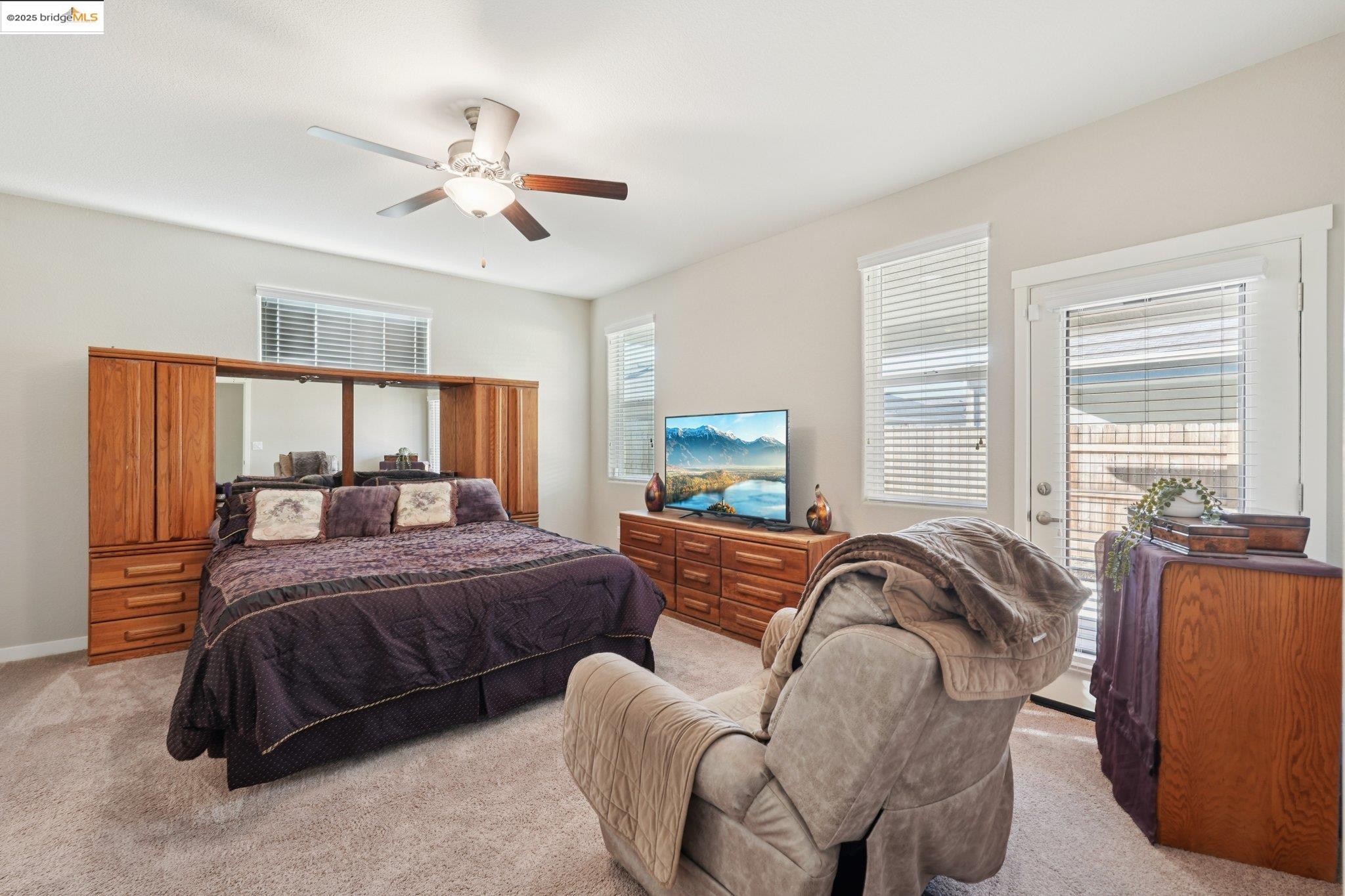 2119 Revival Lane Rio Vista, CA 94571 - Photo 16 of 44 a bedroom with a bed and a couch