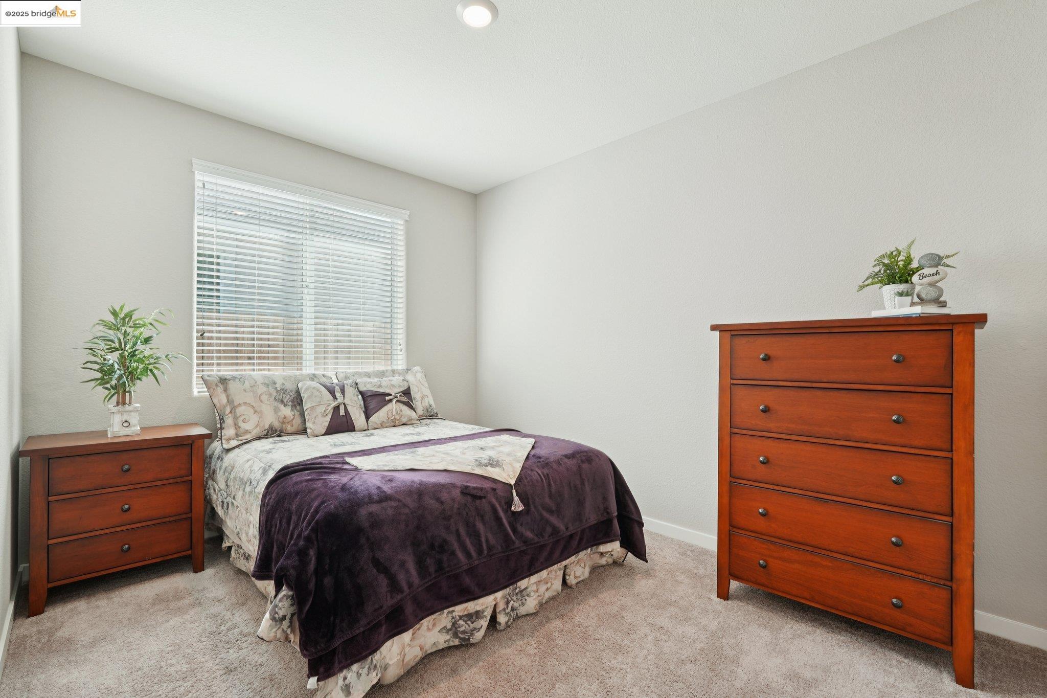 2119 Revival Lane Rio Vista, CA 94571 - Photo 19 of 44 a bedroom with a bed and a dresser