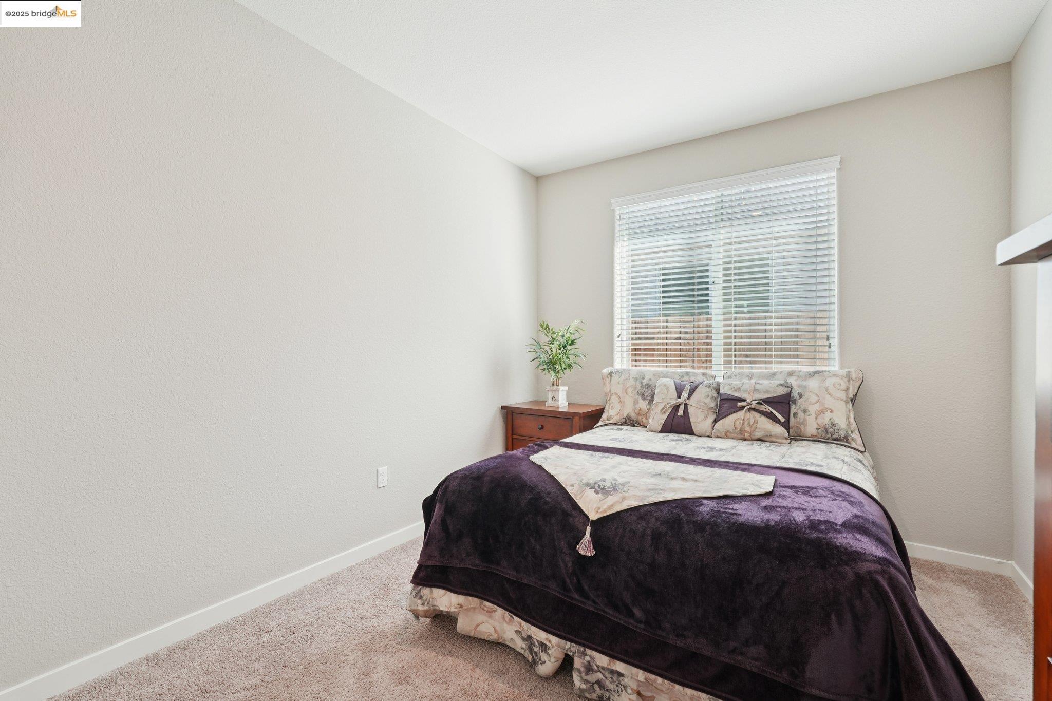 2119 Revival Lane Rio Vista, CA 94571 - Photo 20 of 44 a bedroom with a bed and a window