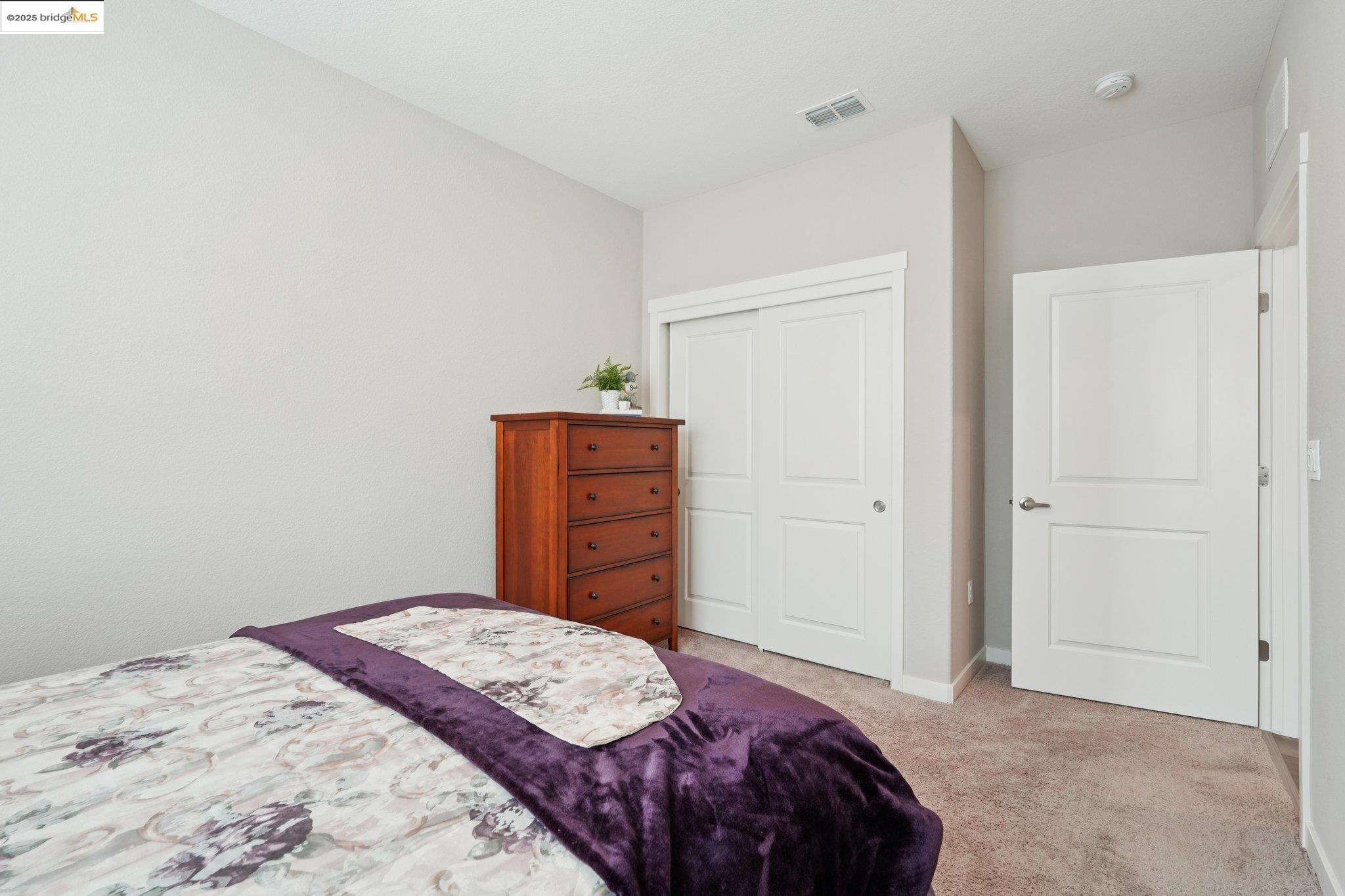 2119 Revival Lane Rio Vista, CA 94571 - Photo 21 of 44 a bedroom with a bed and a cabinets