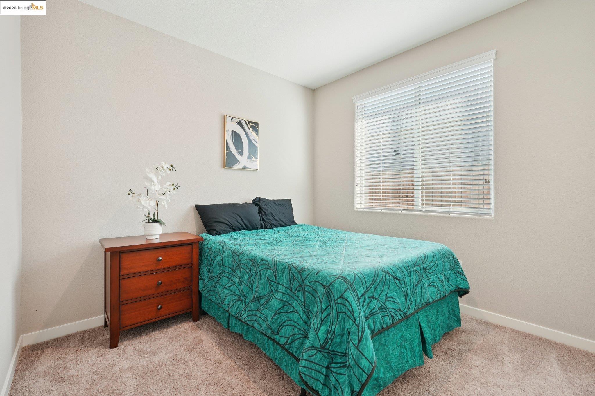 2119 Revival Lane Rio Vista, CA 94571 - Photo 23 of 44 a bedroom with a bed and a window