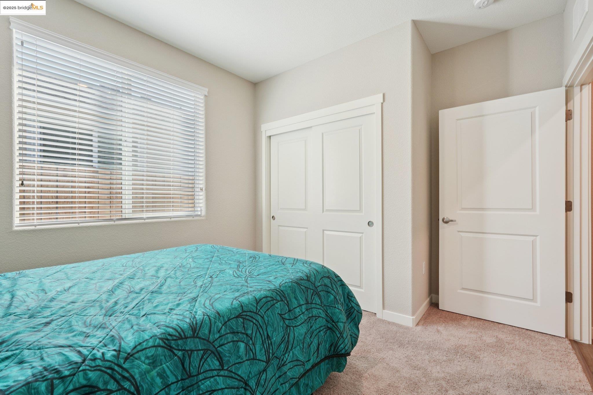 2119 Revival Lane Rio Vista, CA 94571 - Photo 25 of 44 a bedroom with a bed and a window