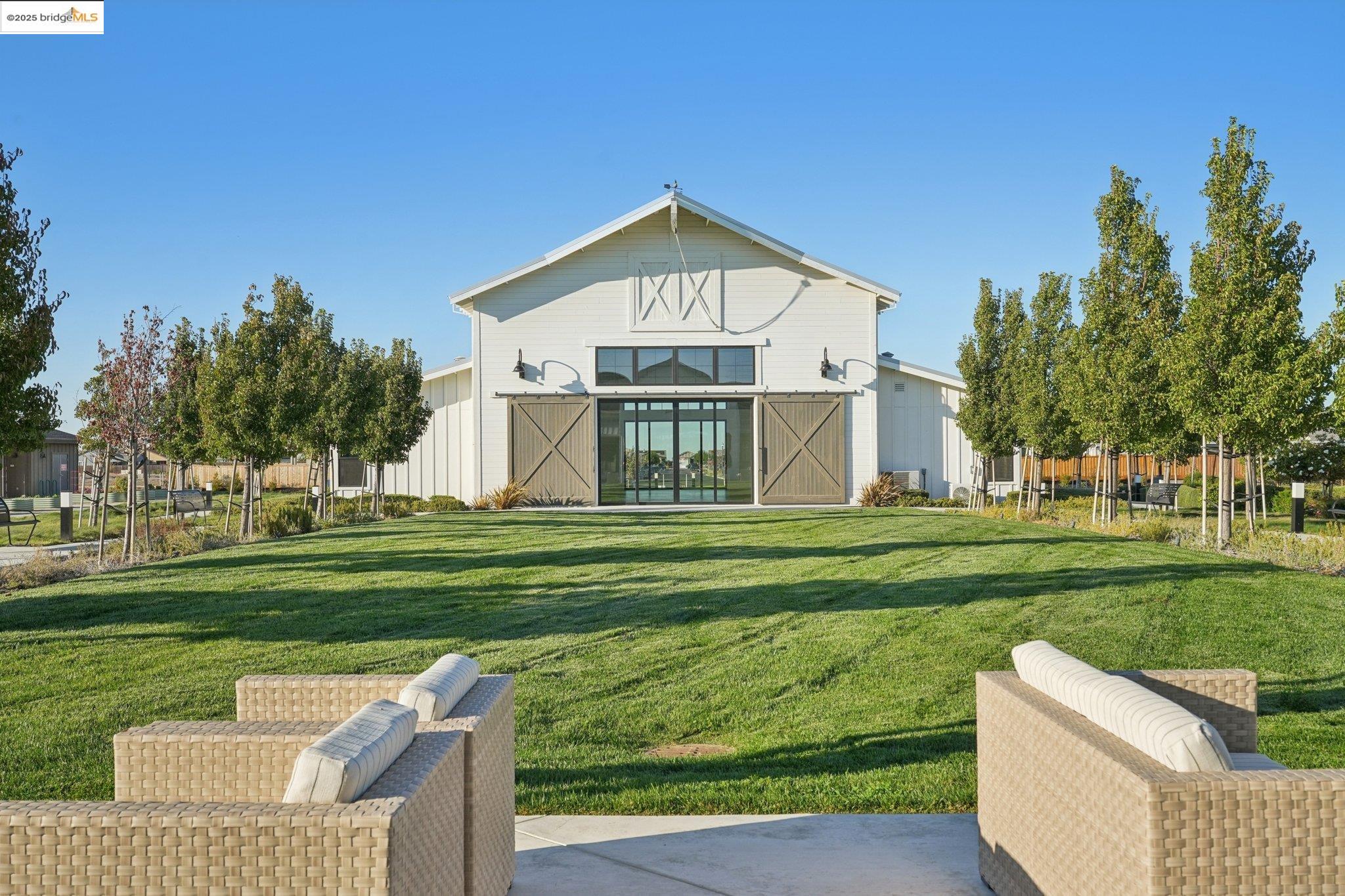 2119 Revival Lane Rio Vista, CA 94571 - Photo 31 of 44 a front view of a house with a yard table and chairs