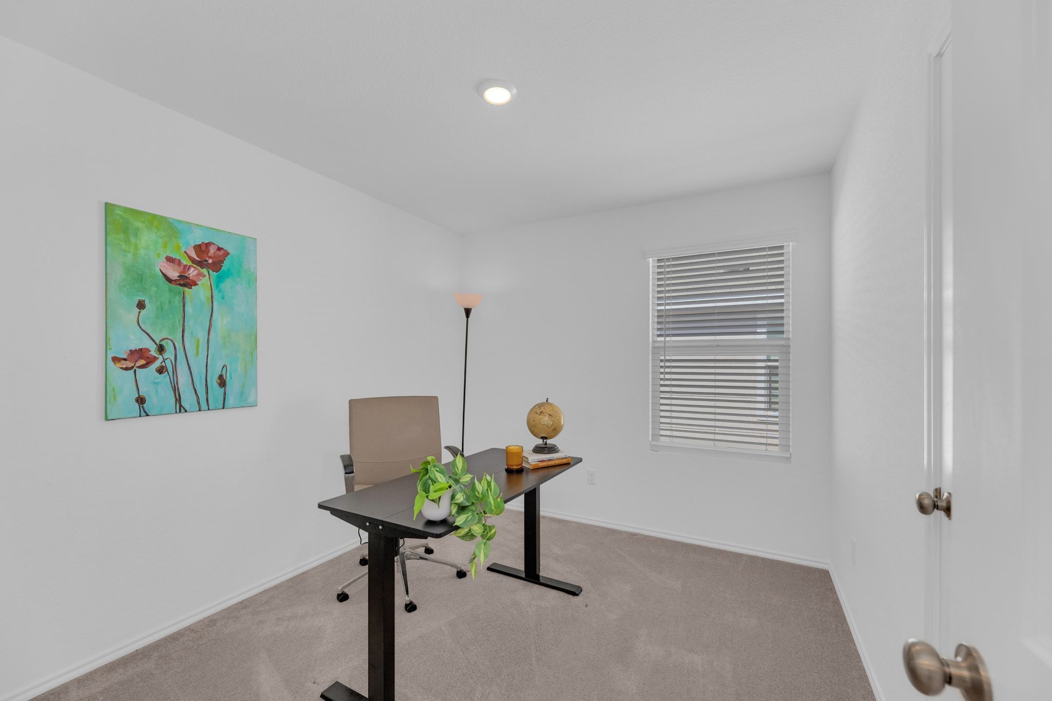 353 Marty Allen Loop Jarrell, TX 76537 - Photo 20 of 34 a view of a workspace with furniture and a window