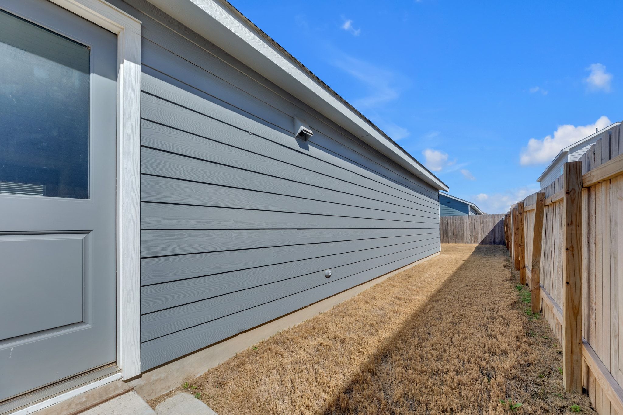 353 Marty Allen Loop Jarrell, TX 76537 - Photo 22 of 34 a view of a backyard