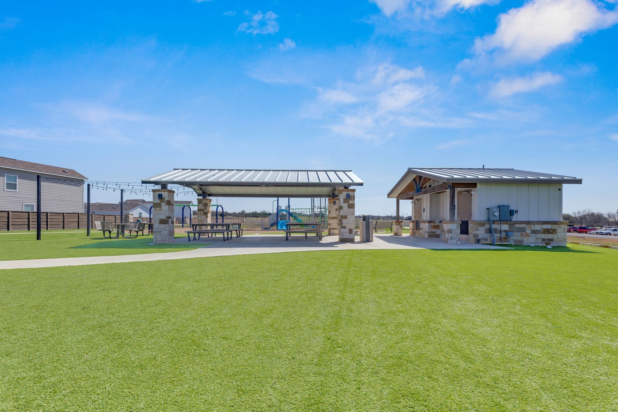 353 Marty Allen Loop Jarrell, TX 76537 - Photo 28 of 34 a front view of a house with swimming pool having outdoor seating