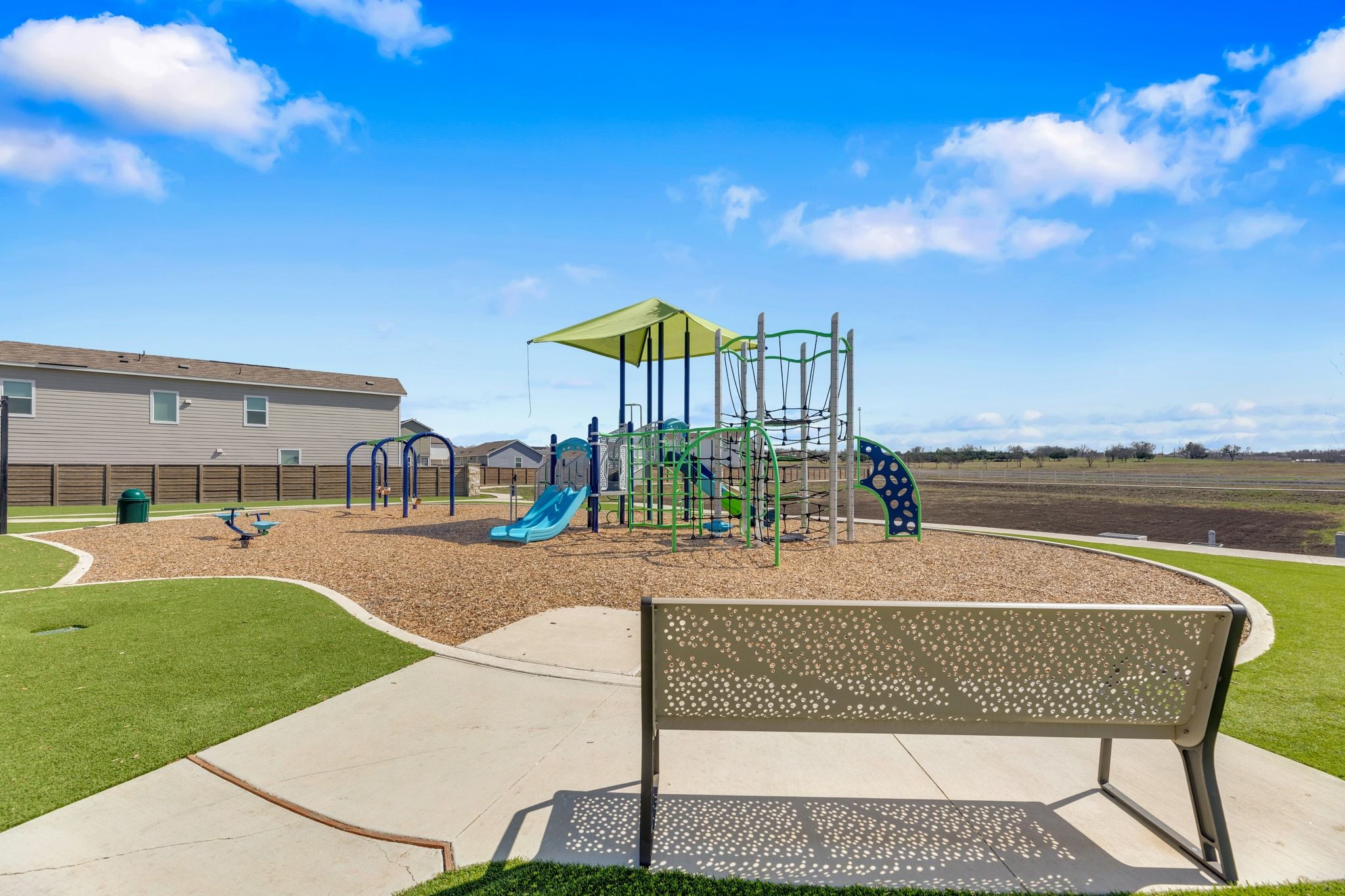 353 Marty Allen Loop Jarrell, TX 76537 - Photo 30 of 34 a view of a patio with a table and chairs