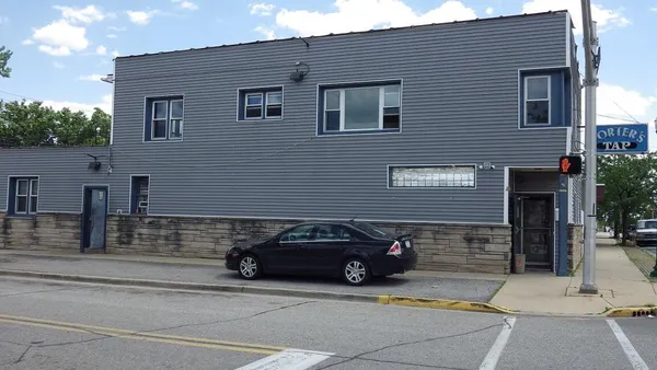 a car parked in front of a house