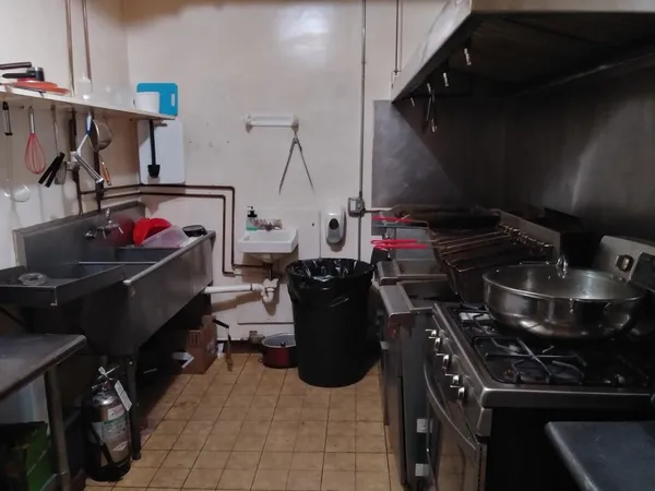 a white refrigerator freezer sitting in a kitchen