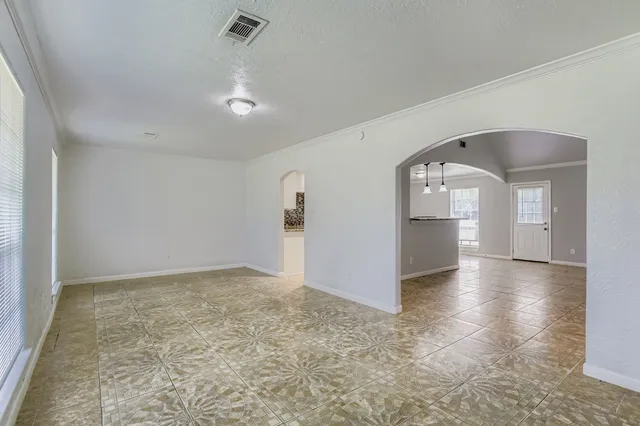 an empty room with windows