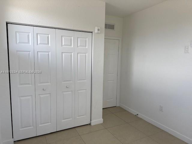13385 Southwest 250th Street, Unit 204 Homestead, FL 33032 - Photo 4 of 8 a view of a hallway