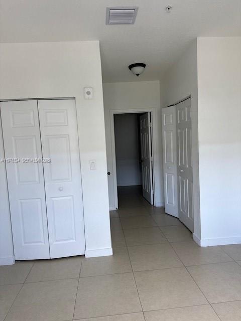 13385 Southwest 250th Street, Unit 204 Homestead, FL 33032 - Photo 7 of 8 a view of a livingroom with an empty space