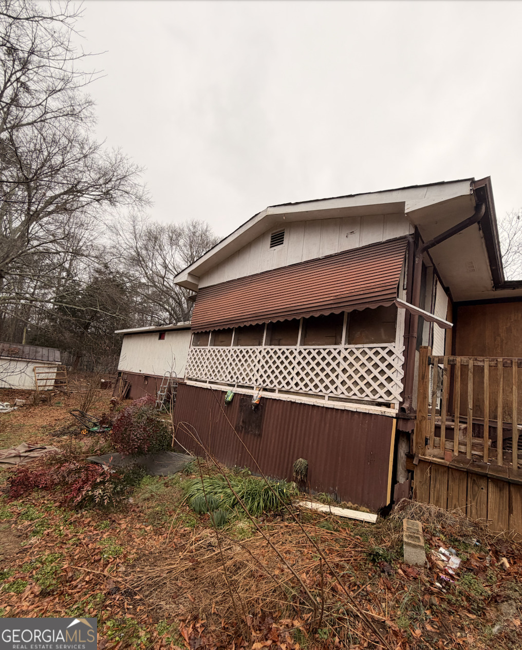 258 Persimmon Street Toccoa, GA 30577 - Photo 4 of 25 a front view of a house with a yard