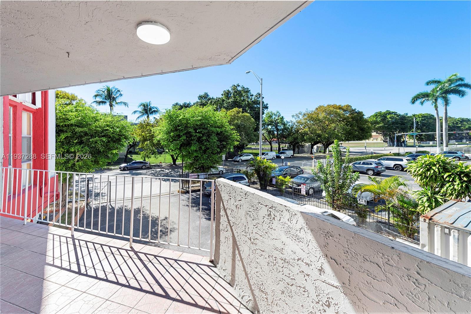 a view of balcony with furniture