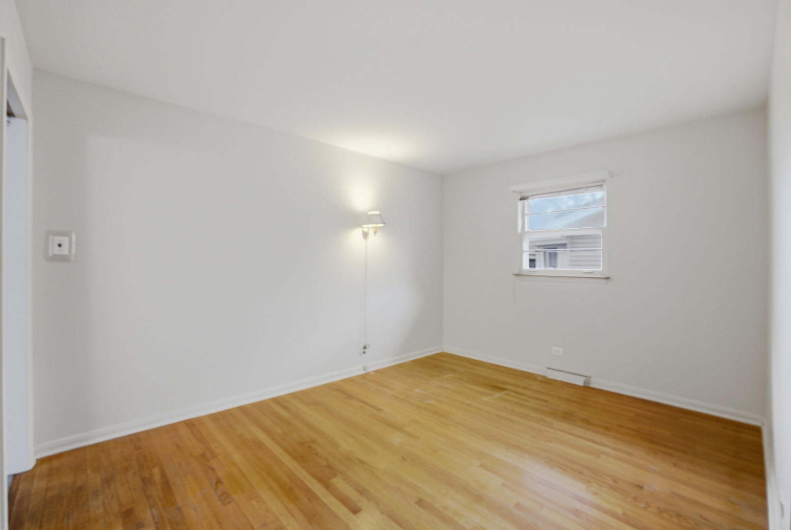1020 Pershing Avenue Wheaton, IL 60189 - Photo 14 of 33 a view of empty room with wooden floor