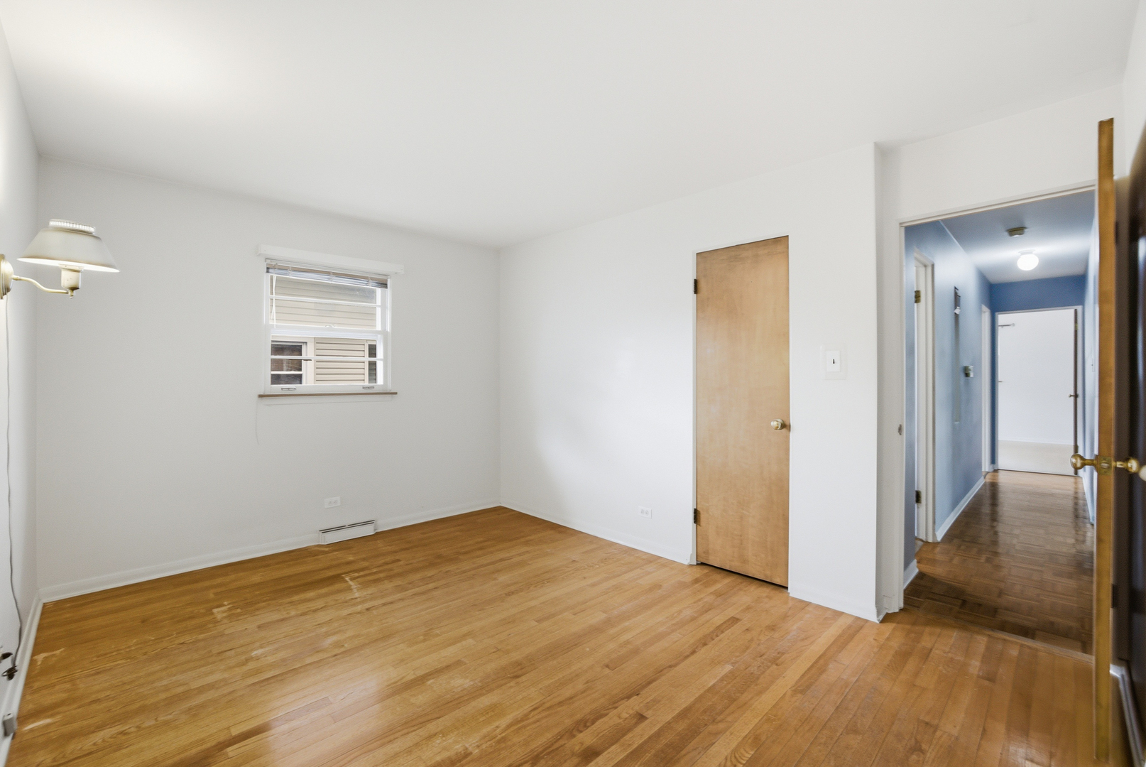 1020 Pershing Avenue Wheaton, IL 60189 - Photo 15 of 33 a view of a room with wooden floor and a bathroom