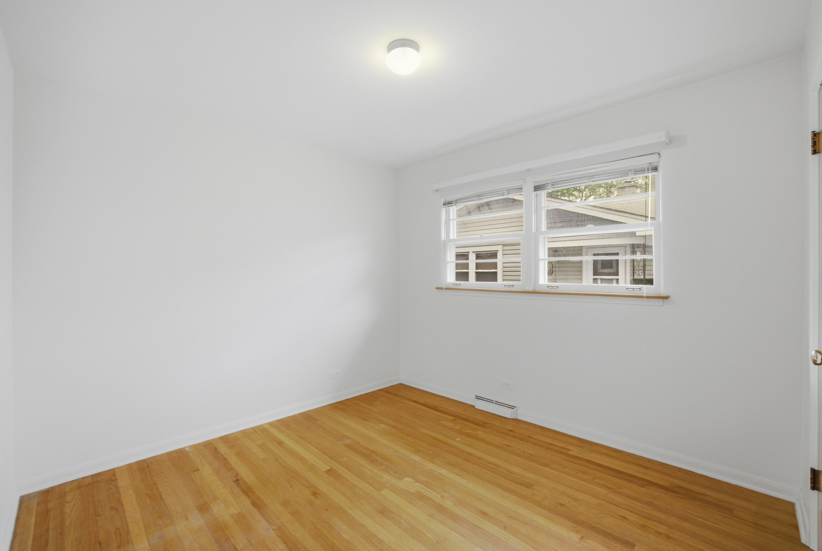 1020 Pershing Avenue Wheaton, IL 60189 - Photo 17 of 33 a view of empty room with wooden floor