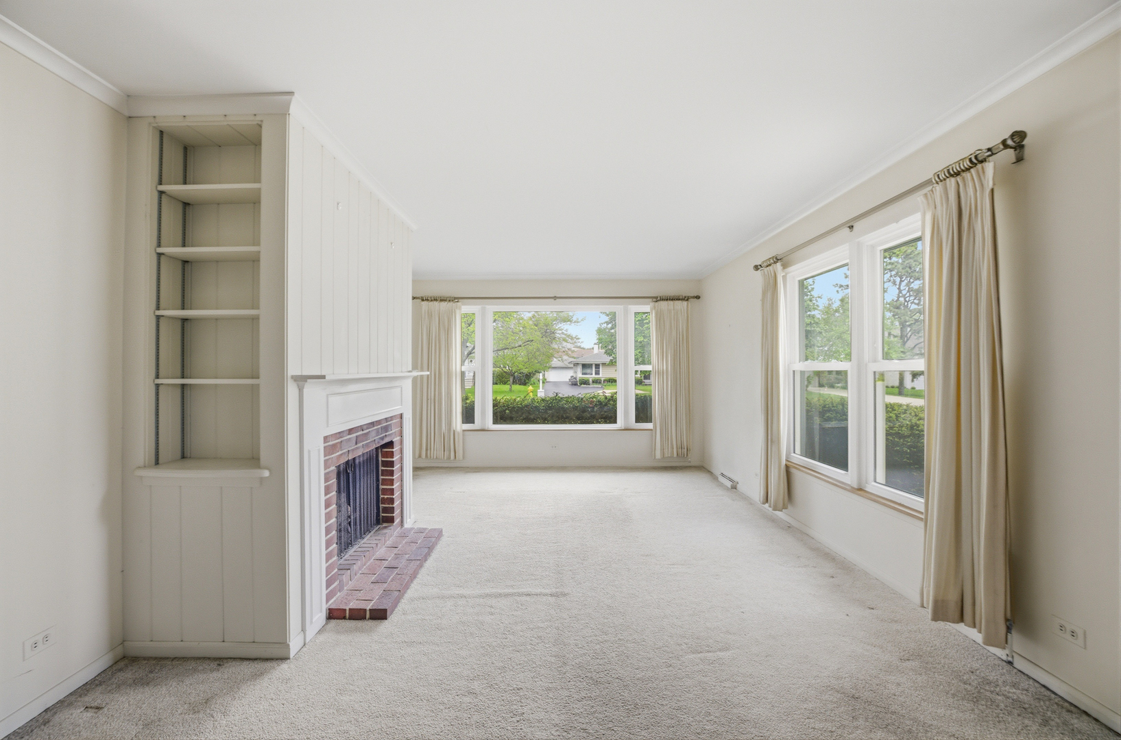 1020 Pershing Avenue Wheaton, IL 60189 - Photo 5 of 33 a view of empty room with floor to ceiling window and an empty room