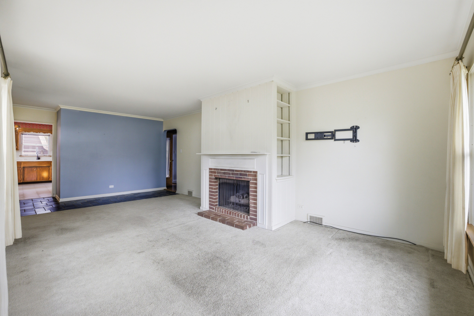 1020 Pershing Avenue Wheaton, IL 60189 - Photo 6 of 33 an empty room with fireplace