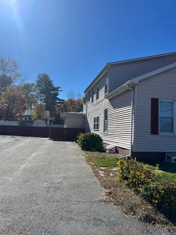 a backyard of a house with lots of green space