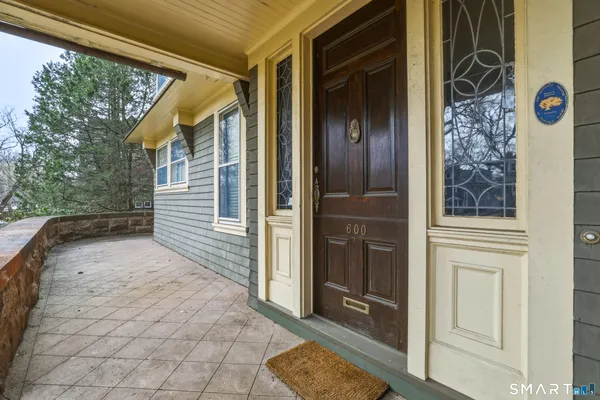 a view of a door and a window