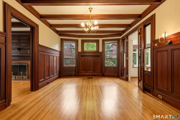 a view of an empty room with glass door
