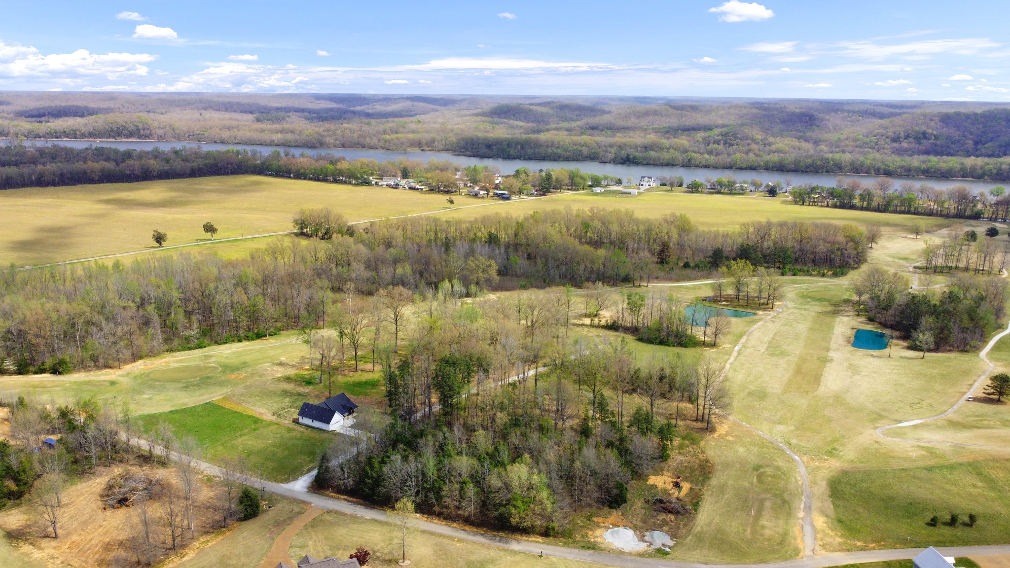 0 Golfview Lane Decaturville, TN 38329 - Photo 3 of 10 a view of a lake with a mountain in the background