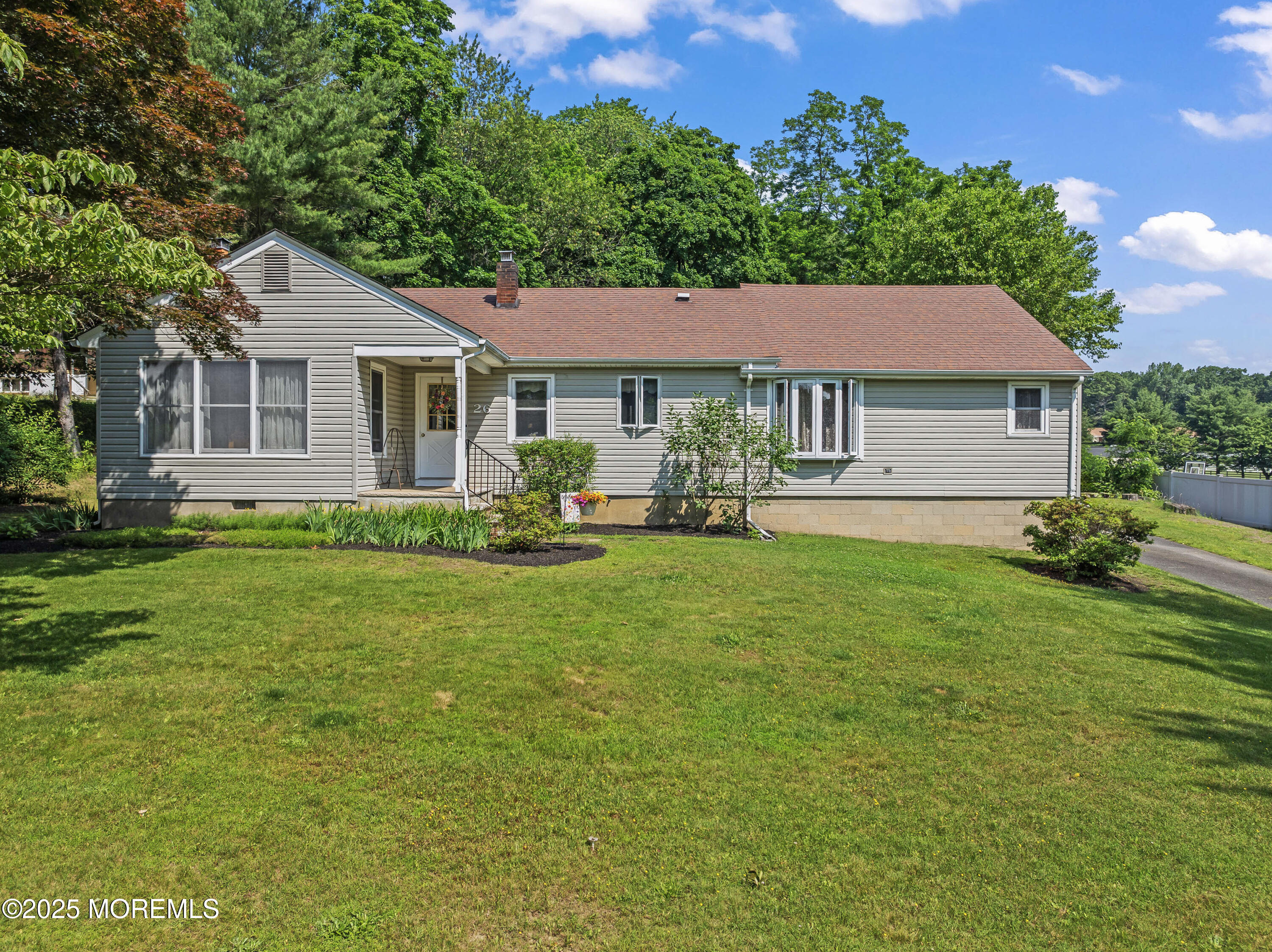 26 Crow Hill Road Freehold, NJ 07728 - Photo 1 of 26 a front view of house with yard and green space