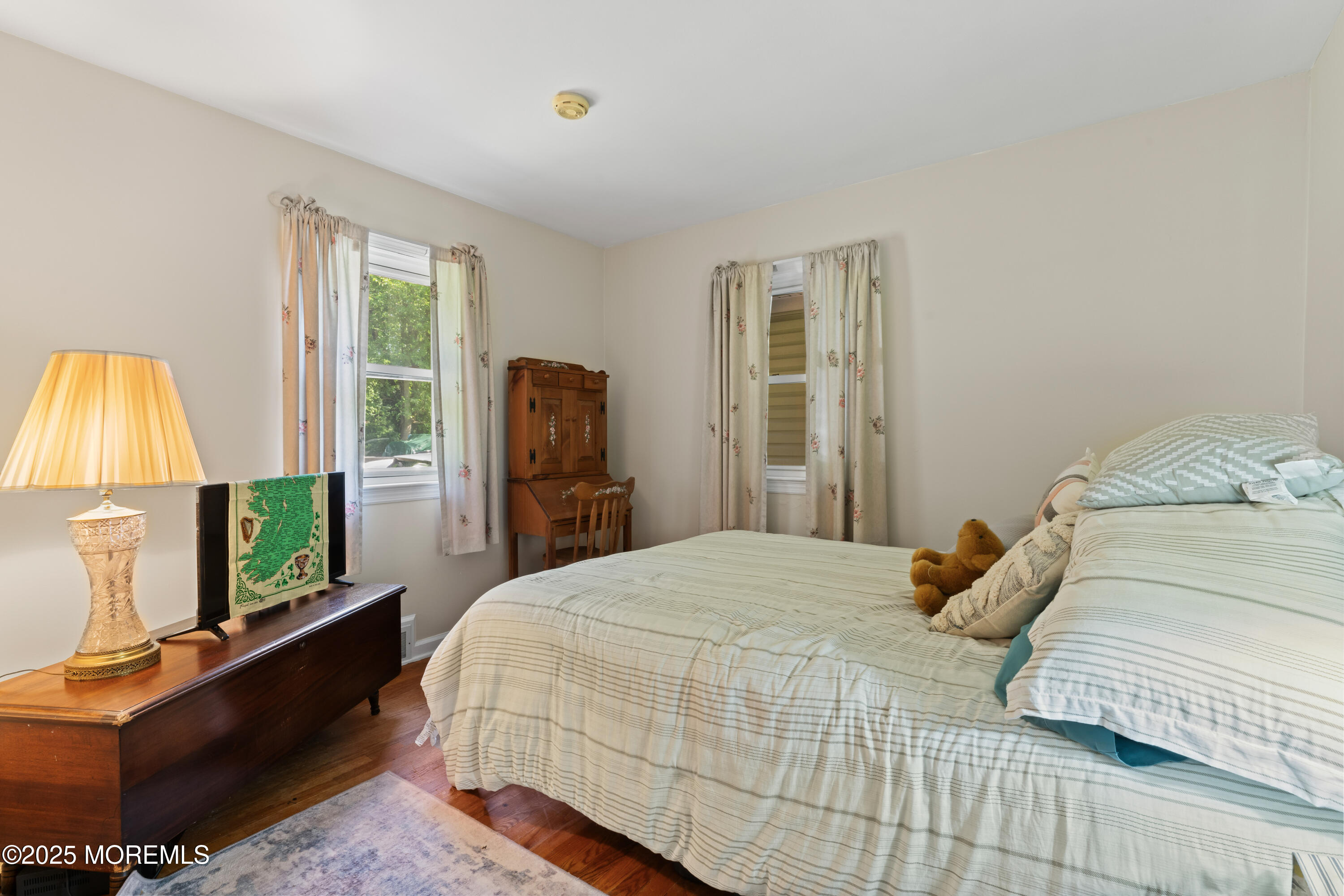 26 Crow Hill Road Freehold, NJ 07728 - Photo 16 of 26 a bedroom with a bed and a large window