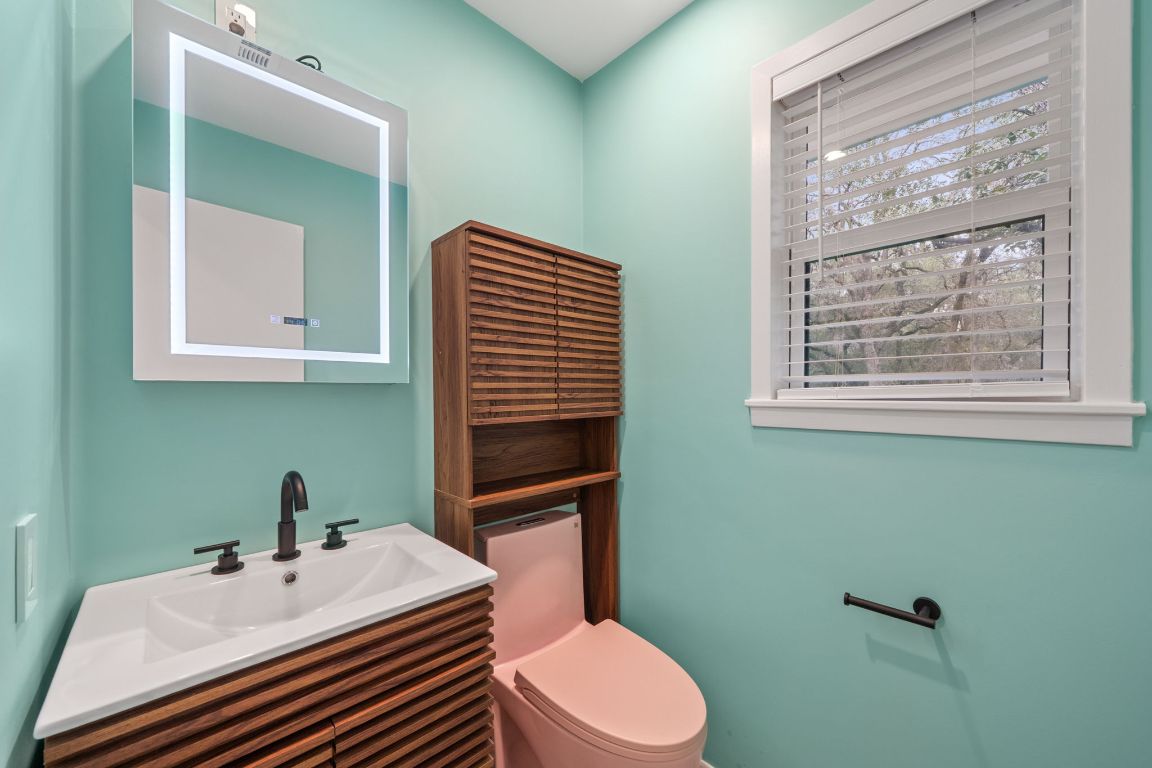 2175 Park Road New Braunfels, TX 78132 - Photo 15 of 39 Half bath with vanity and toilet