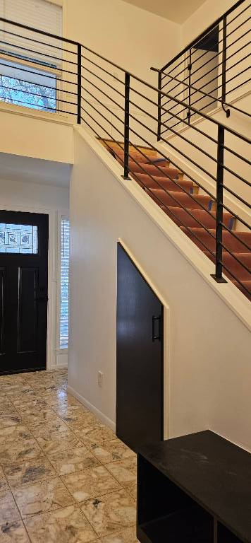 2175 Park Road New Braunfels, TX 78132 - Photo 16 of 39 Foyer featuring a towering ceiling and baseboards