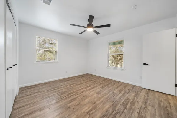 a view of an empty walk in closet