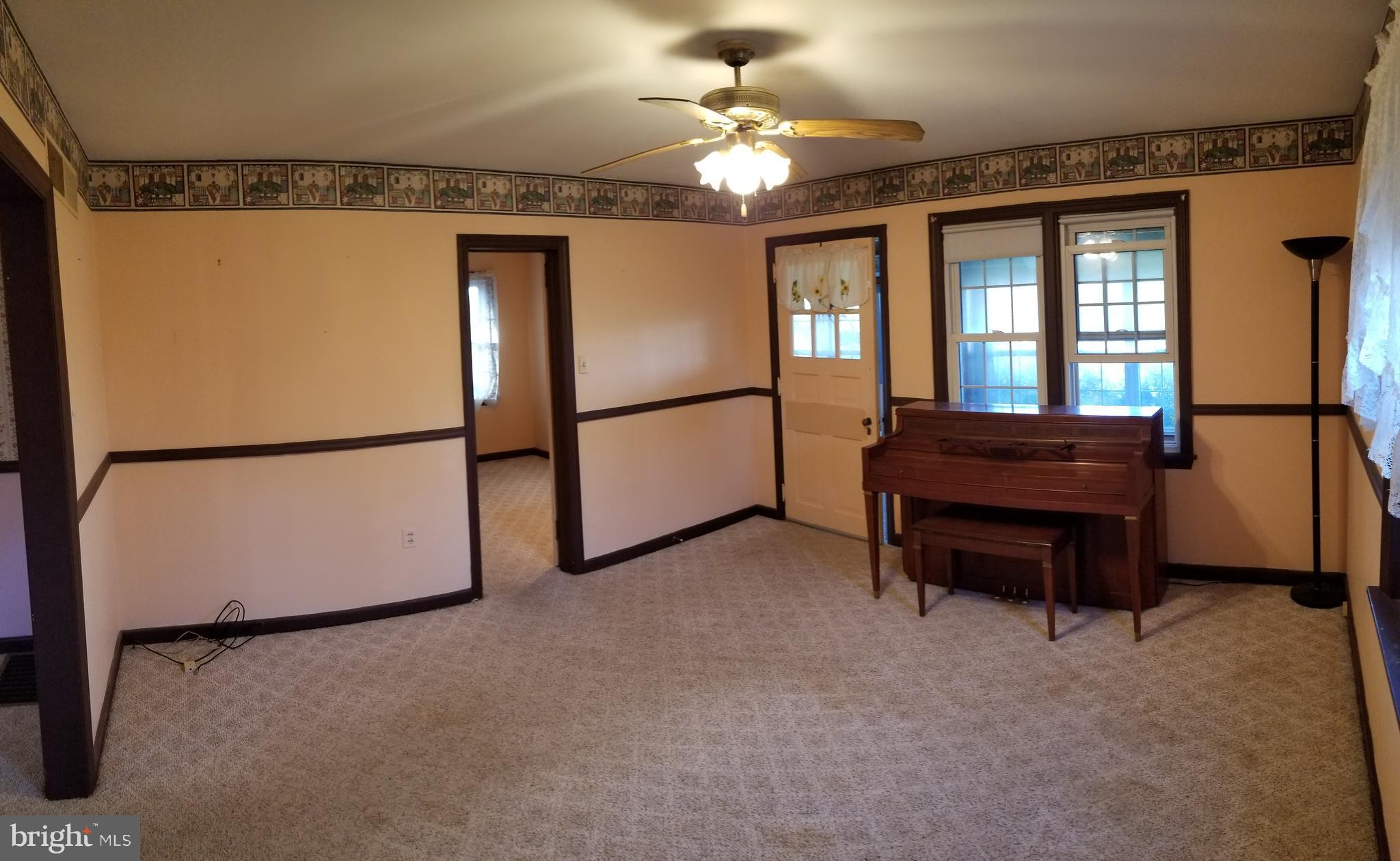1112 Indian Marker Road Conestoga, PA 17516 - Photo 14 of 48 Living Room Facing 3rd Bedroom and Porch