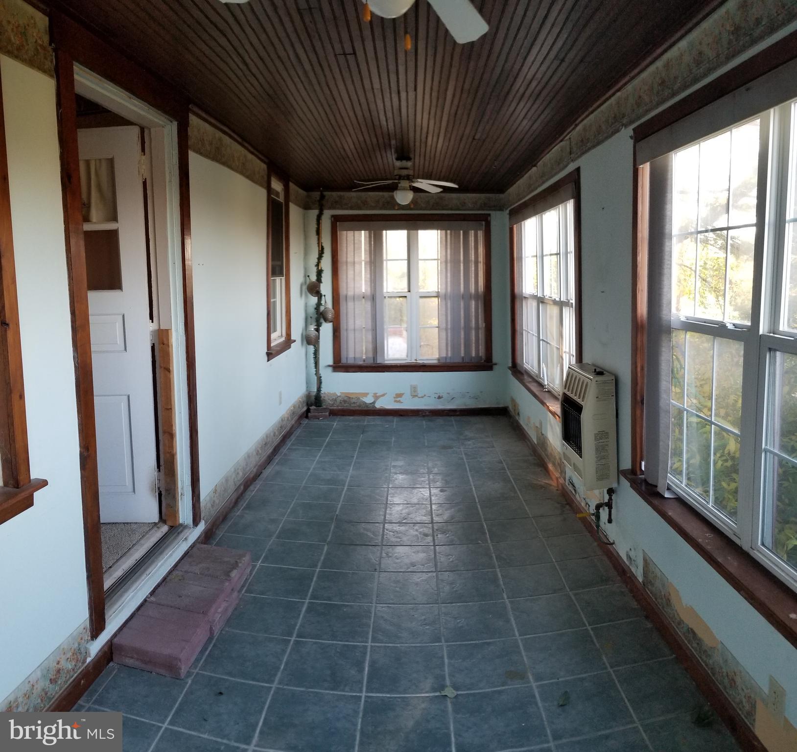 1112 Indian Marker Road Conestoga, PA 17516 - Photo 24 of 48 Closed in Front Porch with Propane Heater