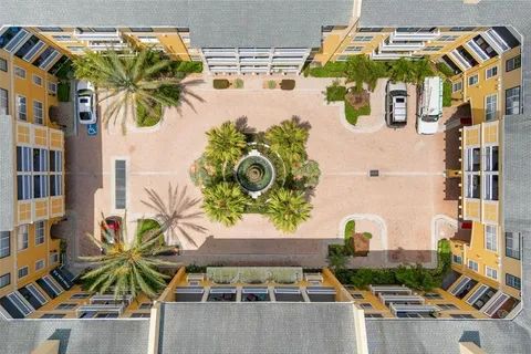 a picture of a building with outdoor seating