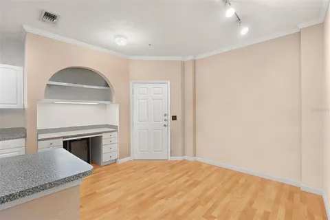 a bedroom with a bed and a fireplace