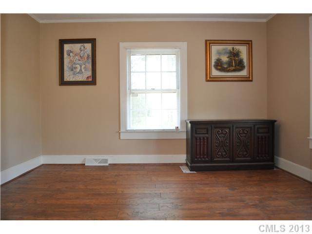 3320 Beaty Road Gastonia, NC 28056 - Photo 11 of 16 a view of an empty room with wooden floor and a window